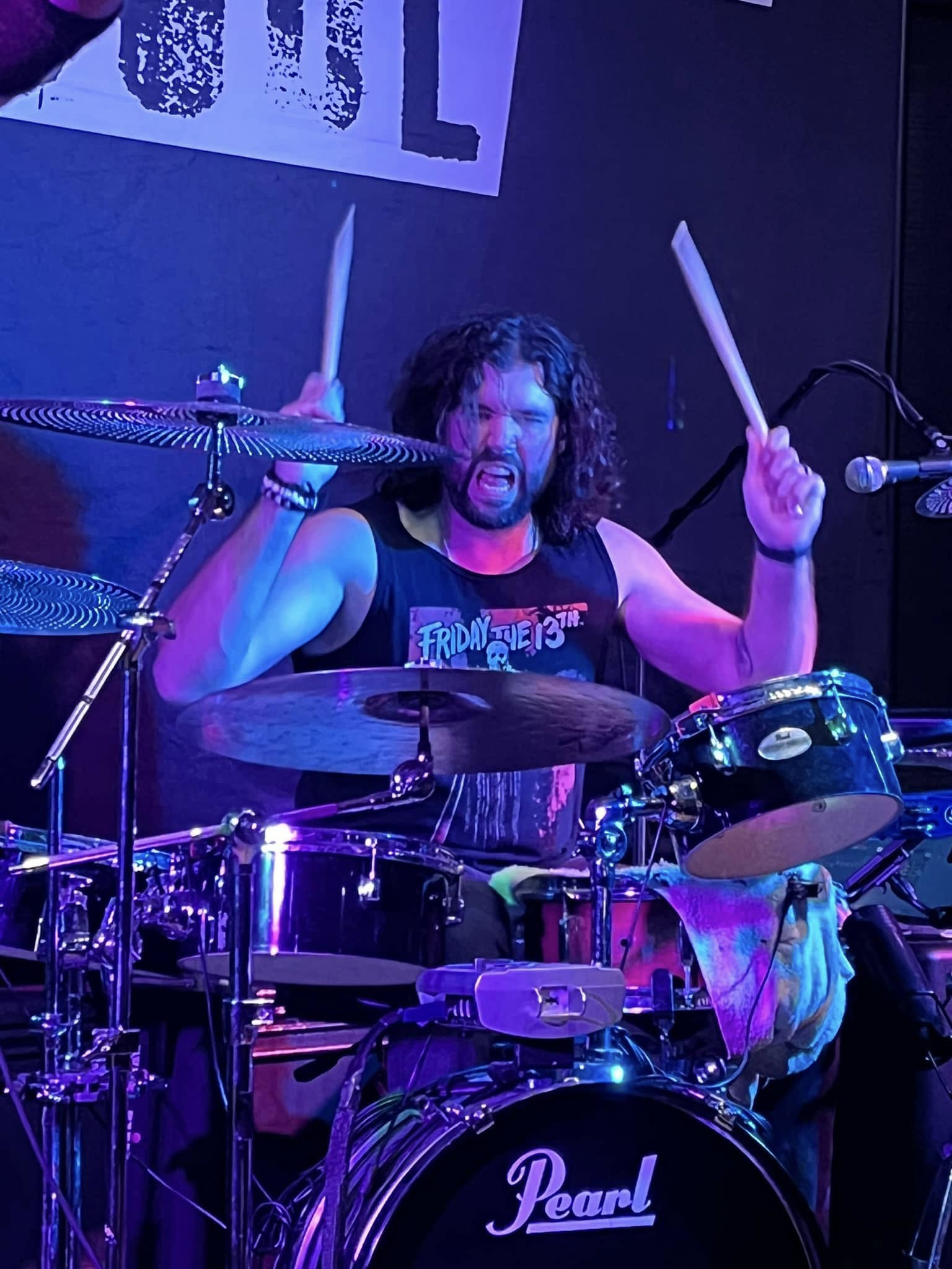 Bryan Walker going hard on drums