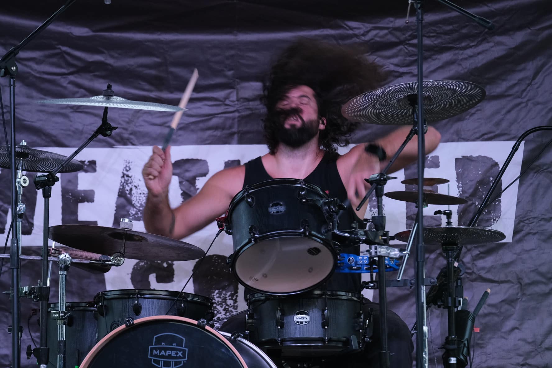 Bryan Walker hair flying on drums